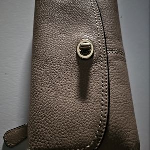 L.N. Women's  coach large cream/ tan bi fold wallet with twist lock